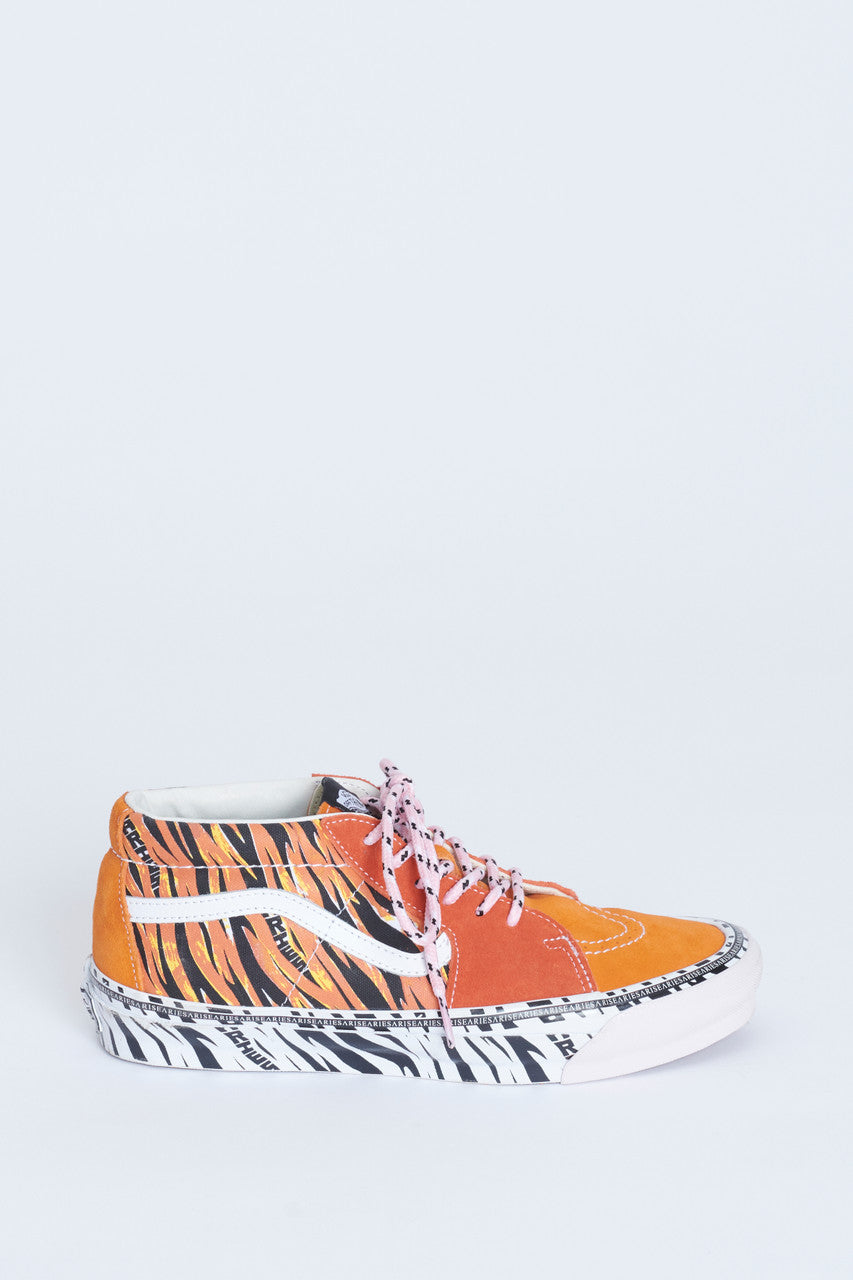 Vans mid hot sale cut shoes