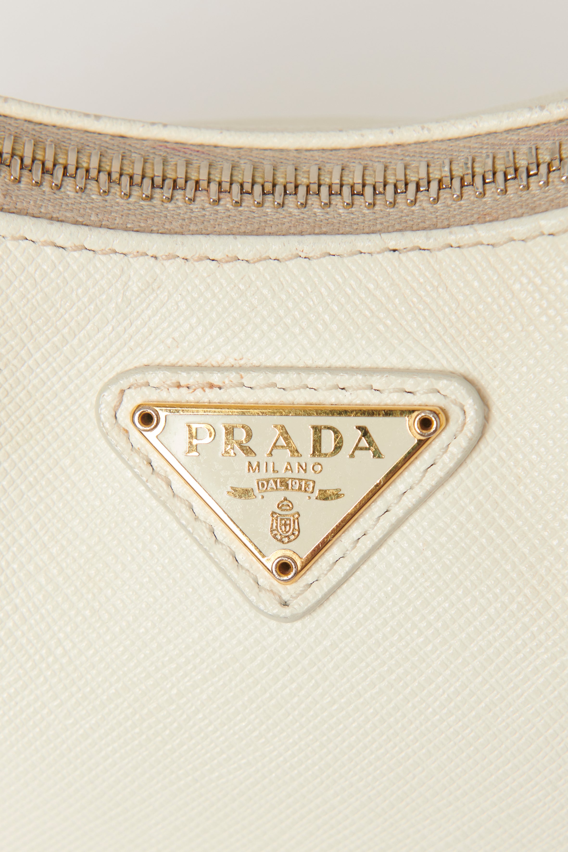 Cream prada online bag