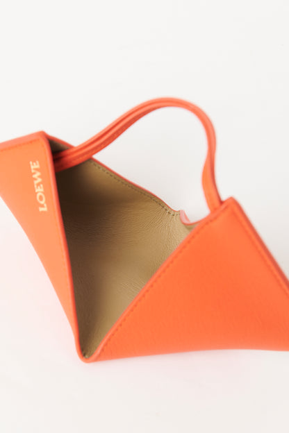 Vivid Orange Leather Preowned Puzzle Fold Charm