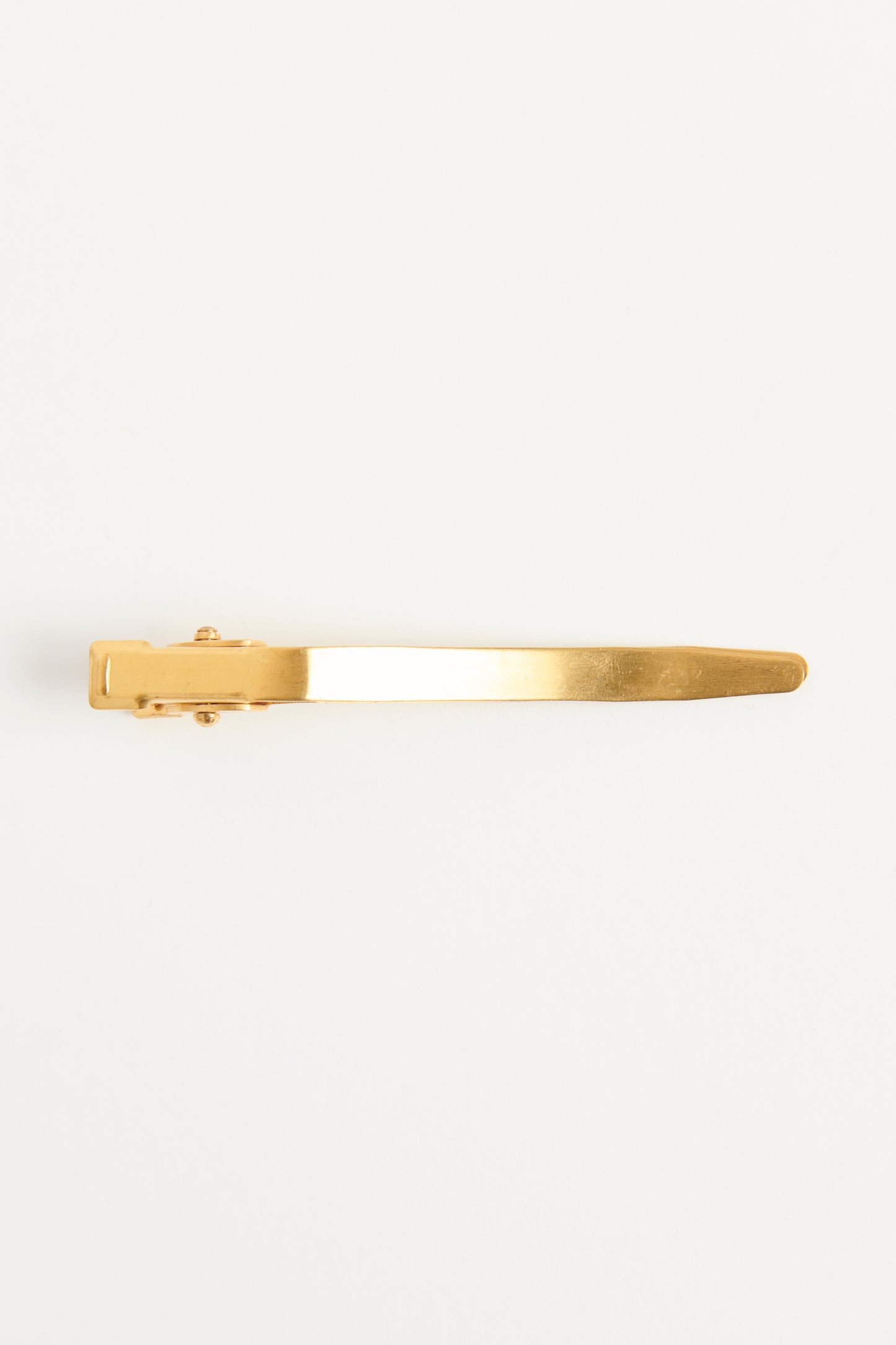 1996 Matte Gold Tone Logo Barrette Preowned Hair Clip