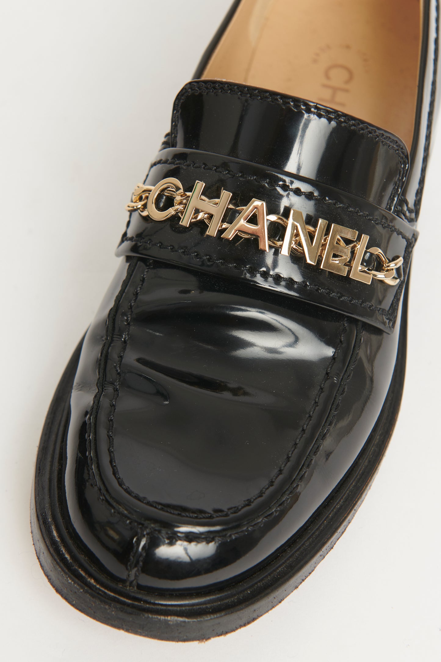 2022 Black Patent Calfskin Preowned Chain-link Logo Loafers