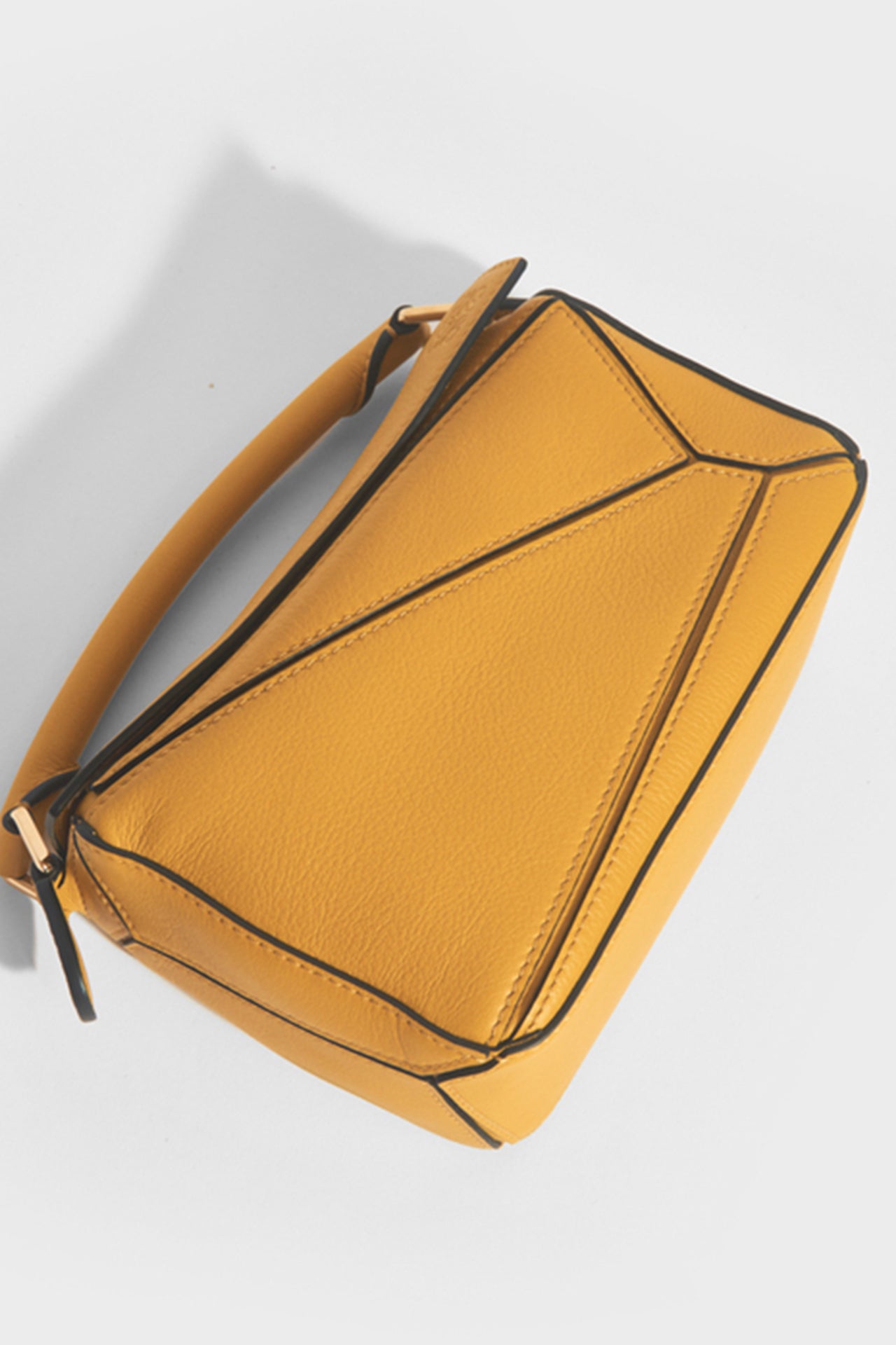 Puzzle Mini Leather Shoulder Bag in Mustard