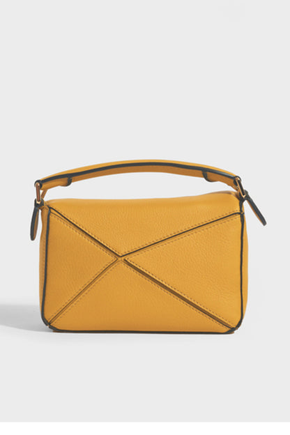 Puzzle Mini Leather Shoulder Bag in Mustard