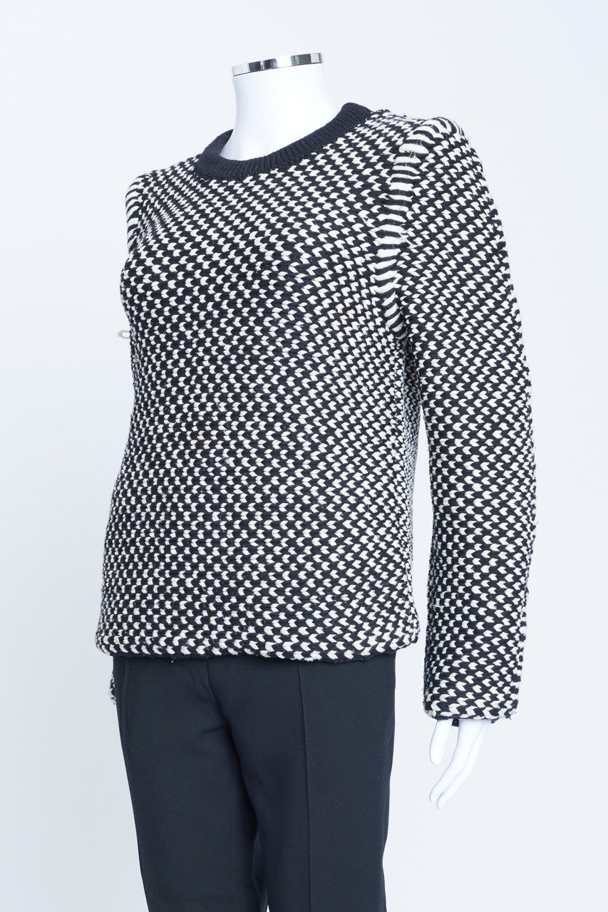 Nicolas Ghesquiere era black and white chunky wool herringbone knit with structured shoulder details.