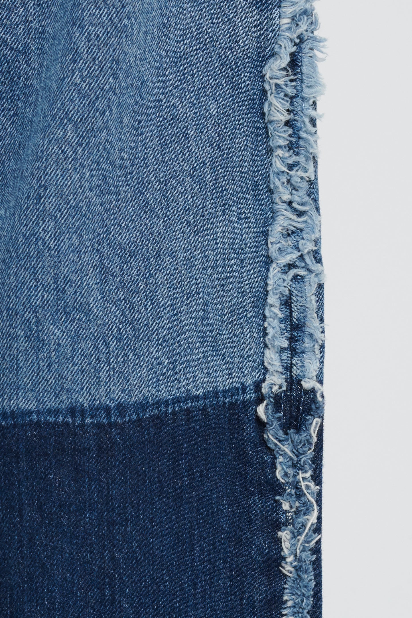 Mid-Blue and Indigo Contrasting Jeans With Frayed Detailing